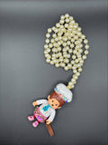 Collier personnage perles et strass (plusieurs modèles)